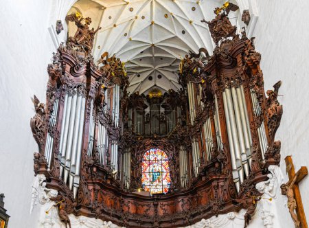 Ancient musical pipe organ in a gothic church