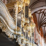 Ancient musical pipe organ in a gothic church