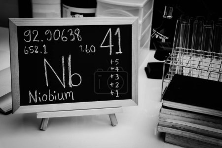 Foto de Niobium and symbol structural formula chemical on the blackboard, Chemistry in the classroom - Imagen libre de derechos