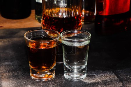 Téléchargez les photos : Red strong alcohol drinks, hard liquors, spirits and distillates iset in glasses - en image libre de droit