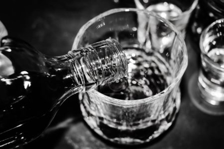 Téléchargez les photos : Red strong alcohol drinks, hard liquors, spirits and distillates iset in glasses - en image libre de droit