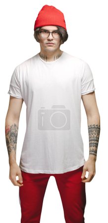 Photo for Hipster handsome male model with glasses wearing white blank t-shirt and red pants and a red hat with space for your logo or design over transparent background - Royalty Free Image