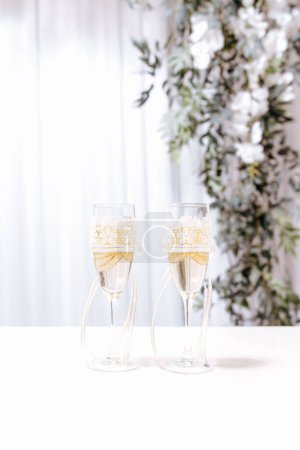 Photo for Original wedding floral decoration in the form of mini-vases and bouquets of flowers hanging from the ceiling. High quality photo - Royalty Free Image