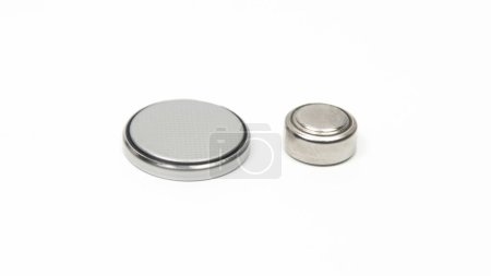 CR2032 and LR44 button cell batteries side by side on a white background.