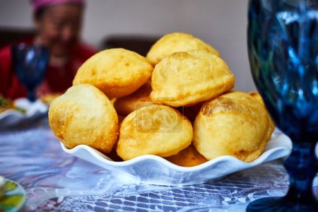 baursak or boortsog traditional fried dough food of the Turkic peoples served on a plate