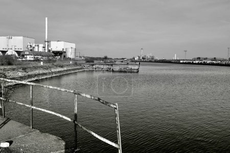 Photo for Barry, Vale of Glam, Wales 02 Feb 2024: The eastern limits of Barry dockland is the active port retaining its traditional industrial landscape. The 160 acre Dow Corning site stretches beyond it. - Royalty Free Image