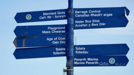 Cardiff Bay, Cardiff, Wales Sept 25 2023: Street signpost giving directions to some of Cardiff's most popular landmark attractions.