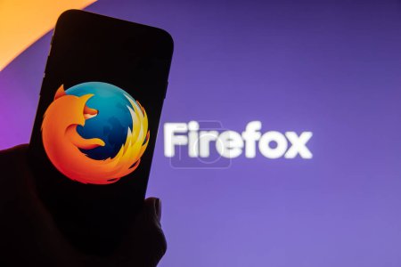 Photo for Rheinbach, Germany  21 November 2022,  The brand logo of the web browser "Mozilla Firefox" on the display of a smartphone (focus on the brand logo) - Royalty Free Image