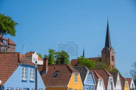 Colorful houses and the St. Marie church in the Danish city of Sonderborg