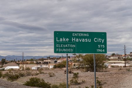 Photo for Entering Lake Havasu City sign with Elevation 575 and Founded 1964. Lake Havasu City is the home of The London Bridge that was relocated form London - Royalty Free Image