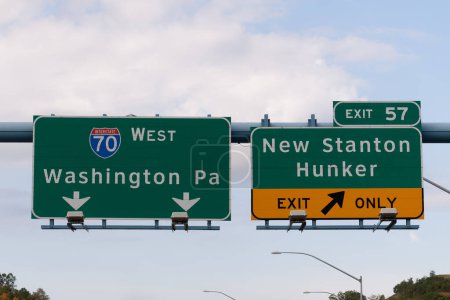 Exit 57 sign for New Stanton and Hunker, Pennsylvania on Interstate 70, Dwight D. Eisenhower Hwy, heading west toward Washington, PA