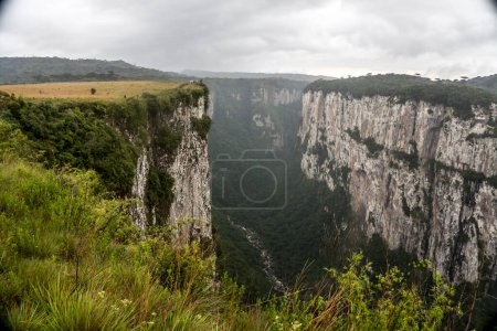 canyon of itaimbezinho seen from above in day with many clouds - Brazil