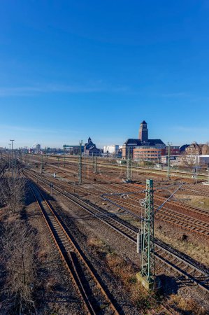 Photo for Berlin, Germany - January 28, 2024: The extensive railroad tracks and industrial buildings in the area of the Westhafen in Berlin. - Royalty Free Image