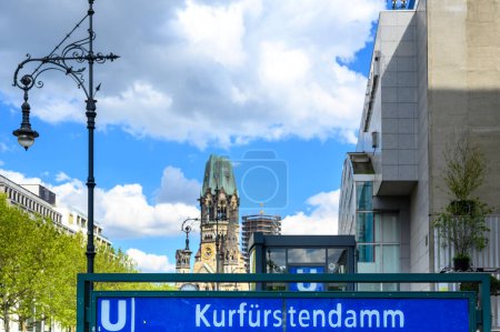Kurfuerstendamm subway station in the center of Berlin with a view of the historic Kaiser Wilhelm Memorial Church.