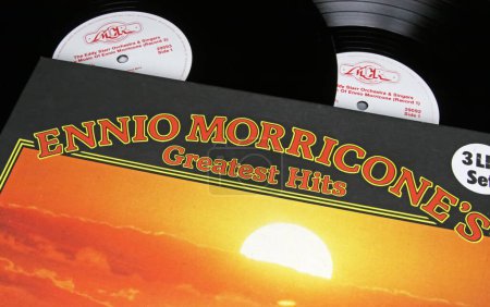 Photo for Viersen, Germany - November 9. 2022: Closeup of isolated vinyl record collection with songs of italian movie film music composer Ennio Morricone - Royalty Free Image