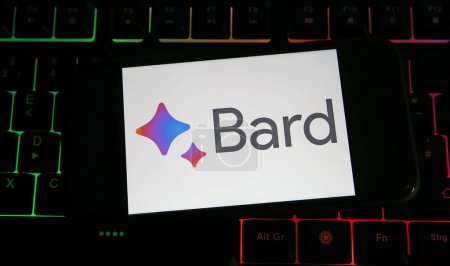Photo for Viersen, Germany - July 9. 2023: Closeup of mobile phone on computer keyboard with logo lettering of Google Bard chatbot - Royalty Free Image