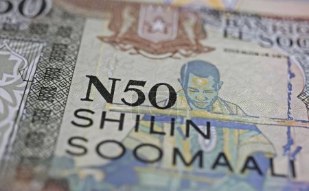Gros plan de vieux billets de banque historiques en shilling somalien