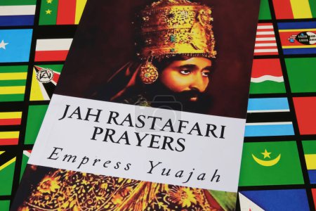 Photo for Viersen, Germany - January 9. 2024: Empress Yuajah book cover Jah Rastafari Prayers, portrait of King Haile Selassie, Bob Marley reggae music album Survival background - Royalty Free Image