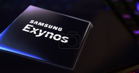 Photo for Viersen, Germany - March 1. 2024: Closeup of smartphone screen with logo lettering of Samsung Exynos processor chip on computer keyboard - Royalty Free Image