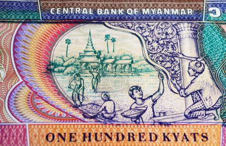 Temple renovation scene on Myanmar 100 Kyat currency banknote (focus on center)