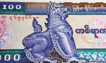 Chinthe lion burmese stylized symbol leograph  on Myanmar Kyat currency banknote from (focus on center)
