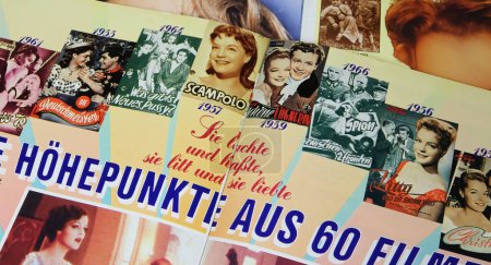 Photo for Viersen, Germany - March 9. 2024: Closeup of magazine page with german actress Romy Schneider filmography cinema movie covers from 50s and 60s - Royalty Free Image