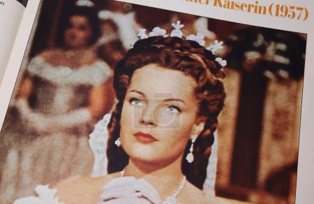 Photo for Viersen, Germany - March 9. 2024: Closeup of magazine page with scene from Sissi Movie from 50s with Romy Schneider as Empress Elisabeth from Austria - Royalty Free Image