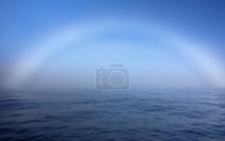 A fogbow over Arctic Ocean near North Cape in Northern Norway on late summer day in August 2022. 