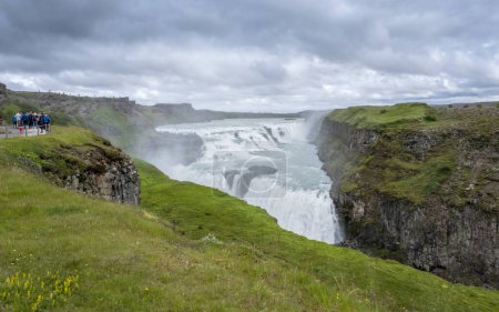 Photo for Tourists at the Gullfoss Waterfall on the Hvita River, Golden Circle, Iceland - Royalty Free Image