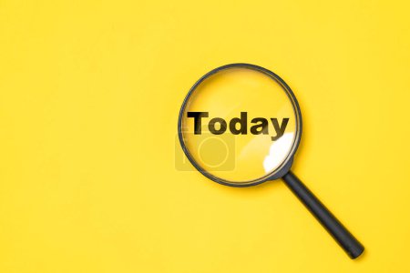 Photo for Today wording inside of Magnifier glass on yellow  background for focus current situation , positive thinking mindset concept. - Royalty Free Image