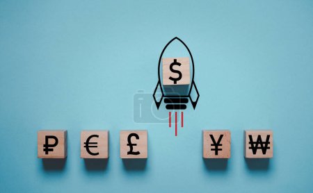 Photo for USD dollar sign with missile rocket move rising from other currency include ruble euro pound sterling yuan and won for FED increasing percentage interest to reduce inflation concept. - Royalty Free Image