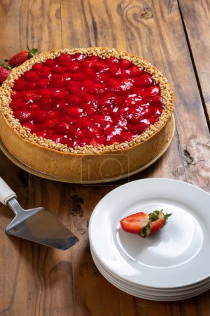 Photo for Strawberry pie on a wooden board - Royalty Free Image