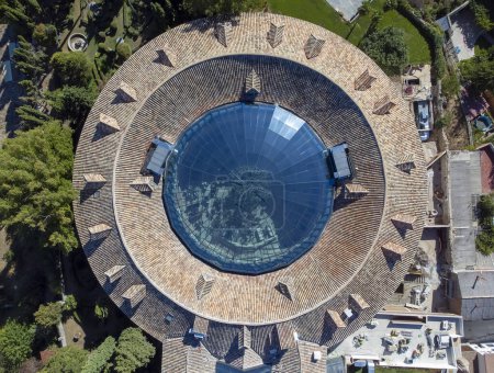 Photo for Aerial image of a blue glass dome over the courtyard of a circular historical building, former cloth factory of Brihuega, Guadalajara, Spain, horizontal - Royalty Free Image