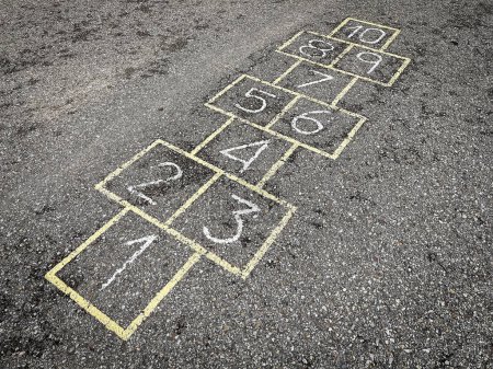 Photo for Popular hopscotch game painted on the asphalt, childhood games, street games, horizontal - Royalty Free Image