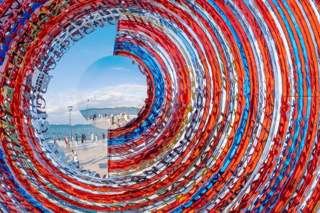 Foto de Escultura de círculos de colores con letras y símbolos en Galataport, Estambul moderno puerto de cruceros, Estambul, Ciudad de los Nombres - Imagen libre de derechos