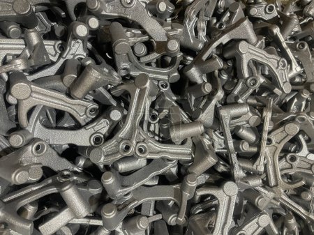 lot of iron die cast parts placed on mass, automotive parts mass production, mass production of iron casting parts, cast iron parts batch mass production, ironcast