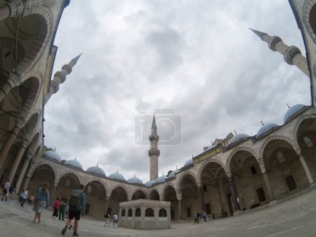 Photo for Fish eye view of the inner courtyard of the Suliman Mosque, with tourists visiting the Muslim temple, perspective deformed by the wide angle lens - Royalty Free Image