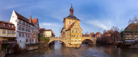 The building of the old medieval town hall on the bridge over the river at sunset. Bamberg. Bavaria Germany.