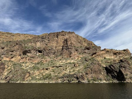 Photo for View from a steamboat, of Canyon Lake reservoir and rock formations in Maricopa County, Arizona in the Superstition Wilderness of Tonto National Forest near Apache Trail.  The lake was formed by damming the Salt River as part of Salt River Project. - Royalty Free Image