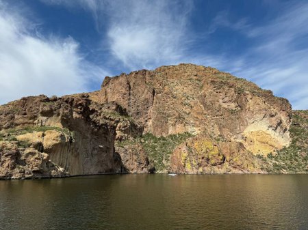 View from a steamboat, of Canyon Lake reservoir and rock formations in Maricopa County, Arizona in the Superstition Wilderness of Tonto National Forest near Apache Trail.  The lake was formed by damming the Salt River as part of Salt River Project.