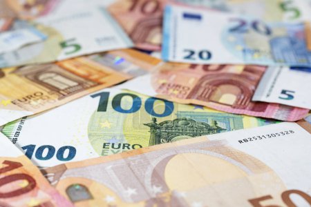 Photo for Different euro banknotes, money concept for economy, business and finance, close up with copy space, selected focus, very narrow depth of field - Royalty Free Image