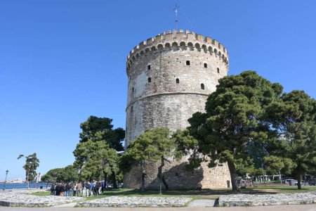 Photo for Thessaloniki, Greece, April 28, 2023: White Tower in Thessaloniki city, Greece, famous landmark and travel destination, blue sky, copy space, selected focus - Royalty Free Image