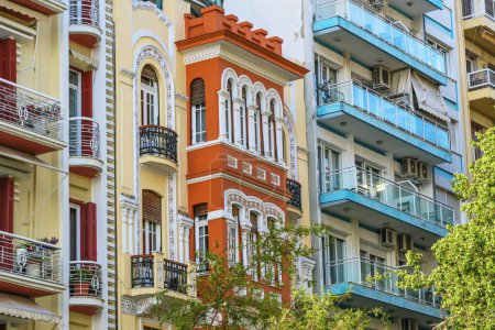 Colorful townhouse facades of historic and modern residential houses in the city center of Thessaloniki, Greece, selected focus