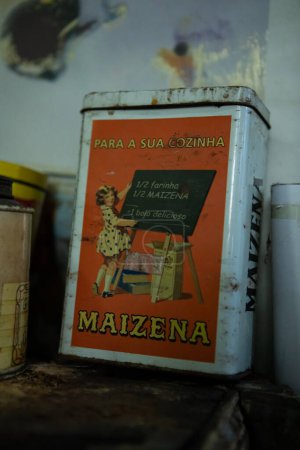Photo for Fafe, Portugal - 10 October 2023: Old vintage portuguese canister of Maizena. Corn starch, maize starch or cornflour canister - Royalty Free Image