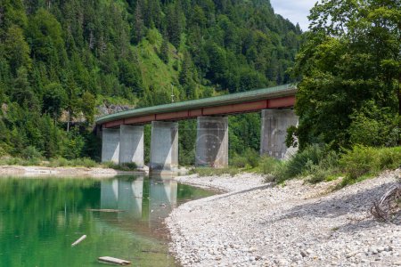 Faller-Klamm-Bruecke with lake Sylvenstein Reservoir and mountain alps panorama in Bavaria, Germany