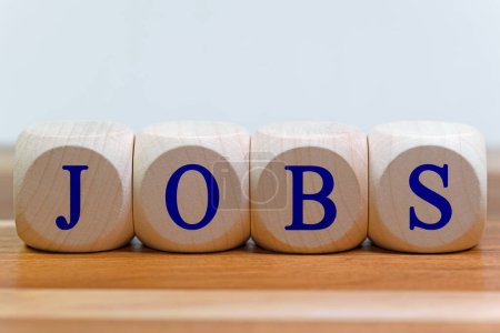 Wooden cubes with the imprint Jobs