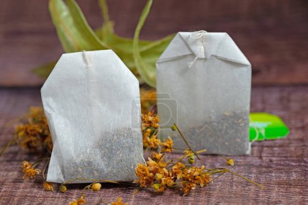 Photo for Dried lime blossom and tea bags - Royalty Free Image