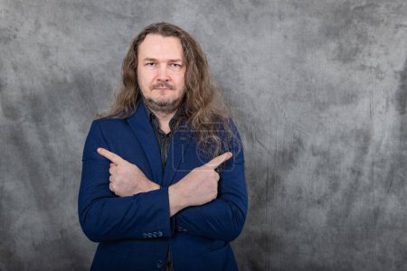 A stylish man with long hair is confidently posing in different stances while wearing a sharp blue suit, portraying professionalism and versatility in business or fashion contexts.