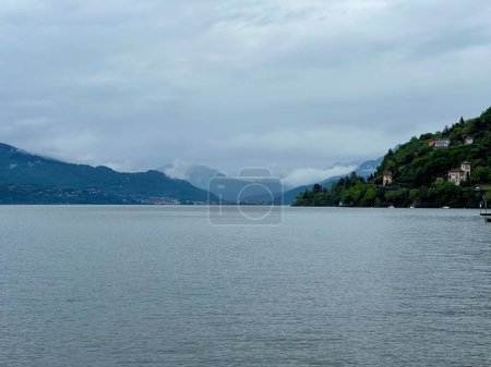 Atmospheric View from Cannobio Across Lake Maggiore Toward the Misty Hills of Luino, Verbano-Cusio-Ossola, Piedmont, Italy