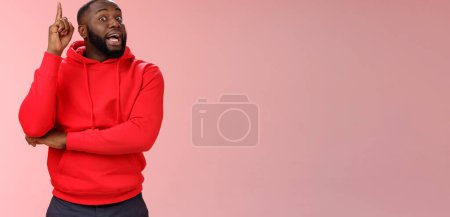 Photo for Got idea. Portrait excited african-american bearded guy inhale air have speech reise index finger eureka gesture wanna add word, have excellent plan sharing thoughts, standing pink background. - Royalty Free Image
